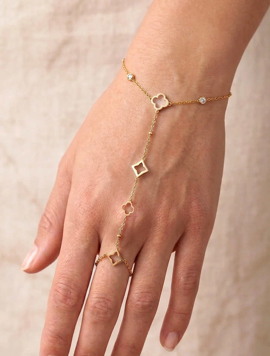 Fijne ketting met opengewerkte bedeltjes - Goud