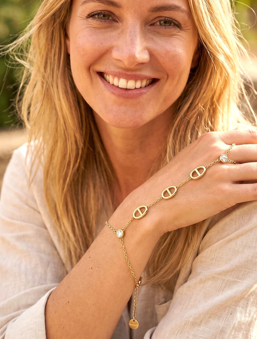 Handketting met een witte zirkonia en maritieme schakels - Goud