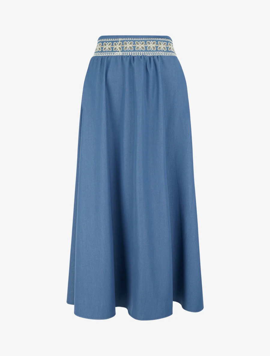 Lange effen rok met geborduurde band. - Blauw