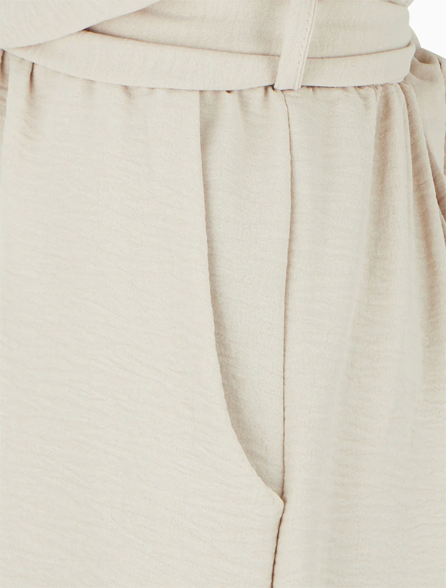 Mouwloze overslag jumpsuit - Beige - Image 3