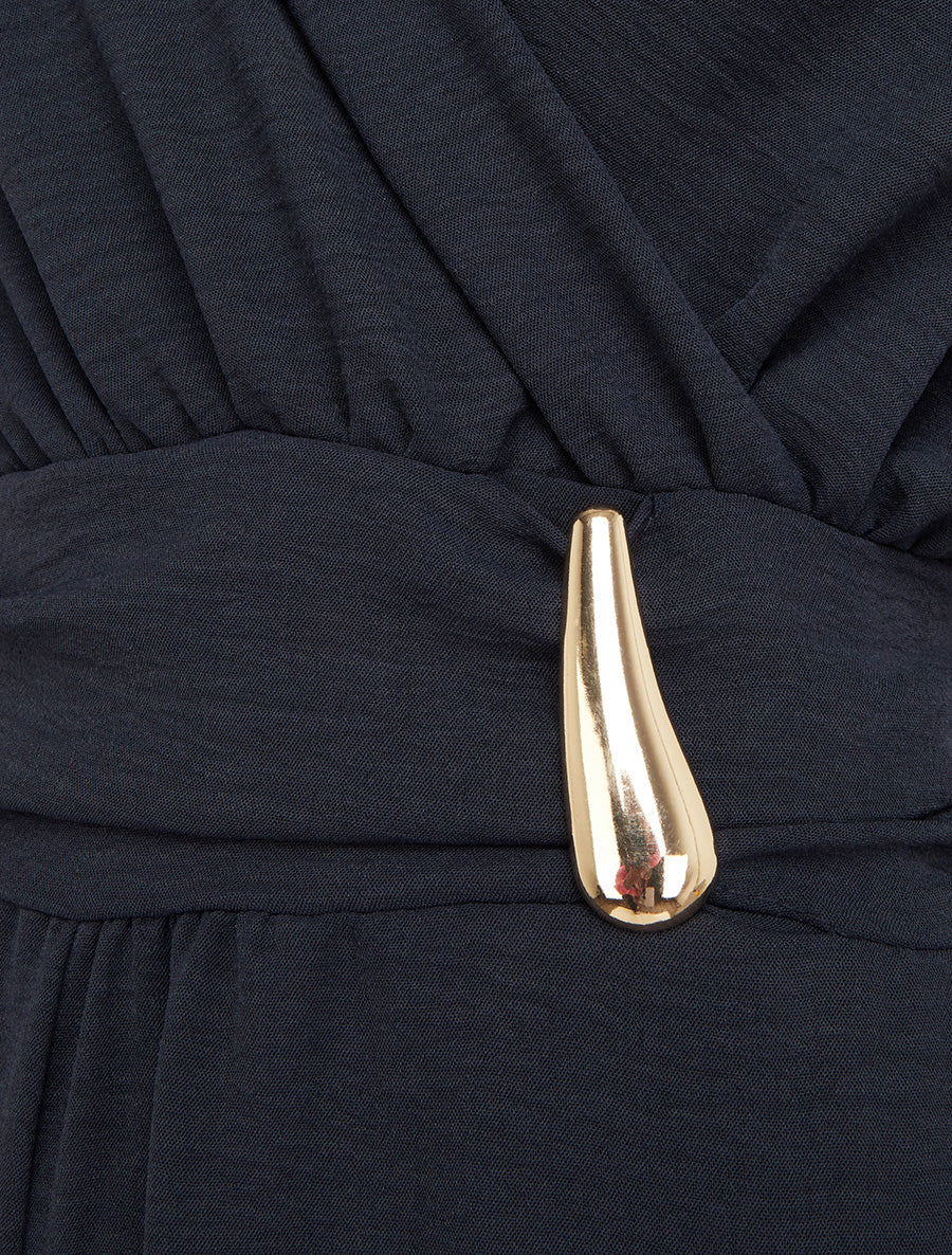 Ruime jumpsuit met wikkeloverslag en draperend effect - Marine - Image 3
